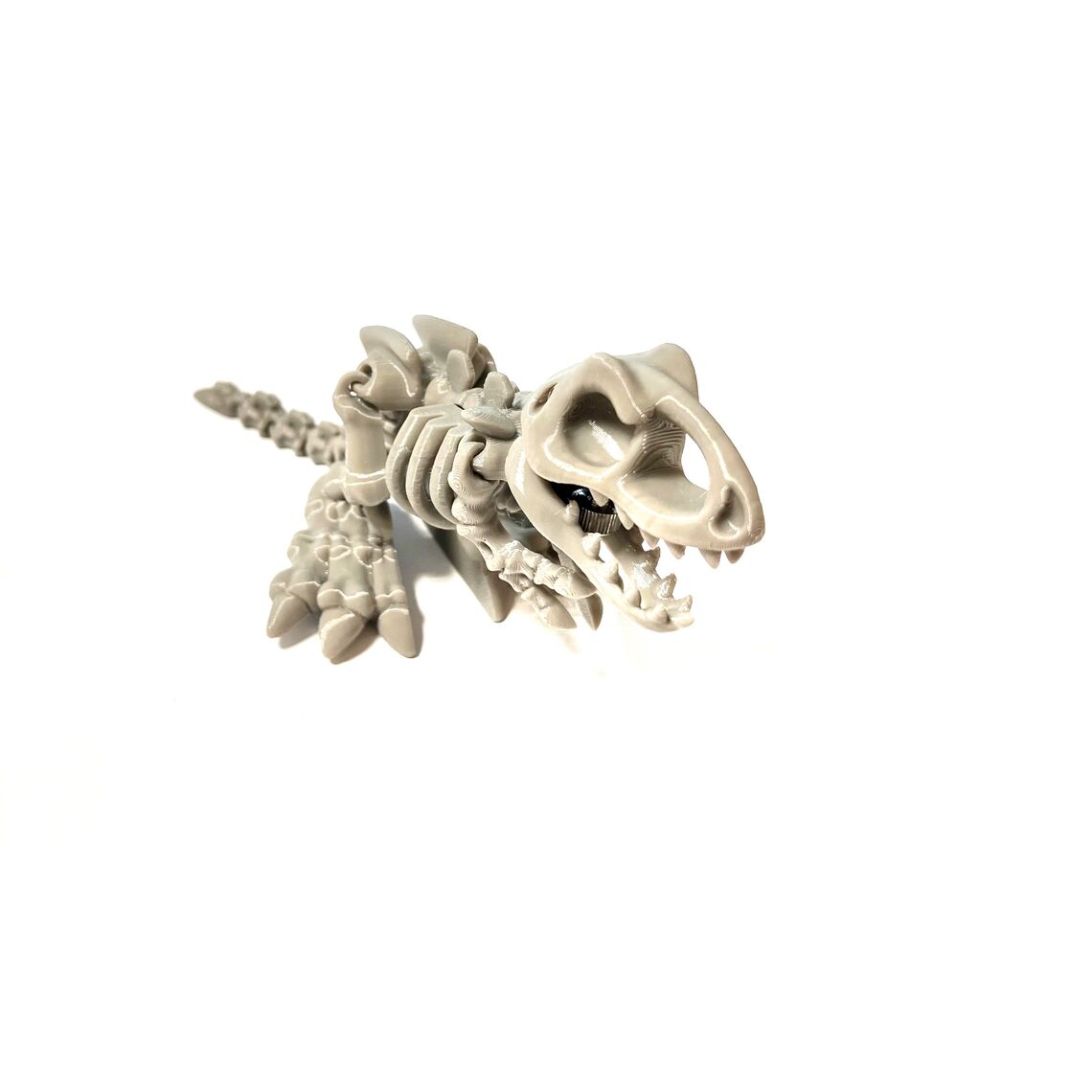 Подвижная игрушка Дино