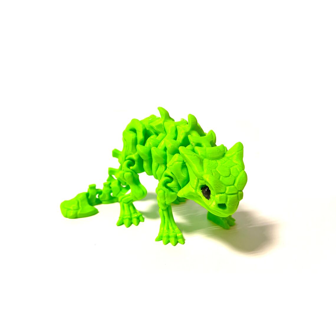 Подвижная игрушка Динозавр  (зеленый)